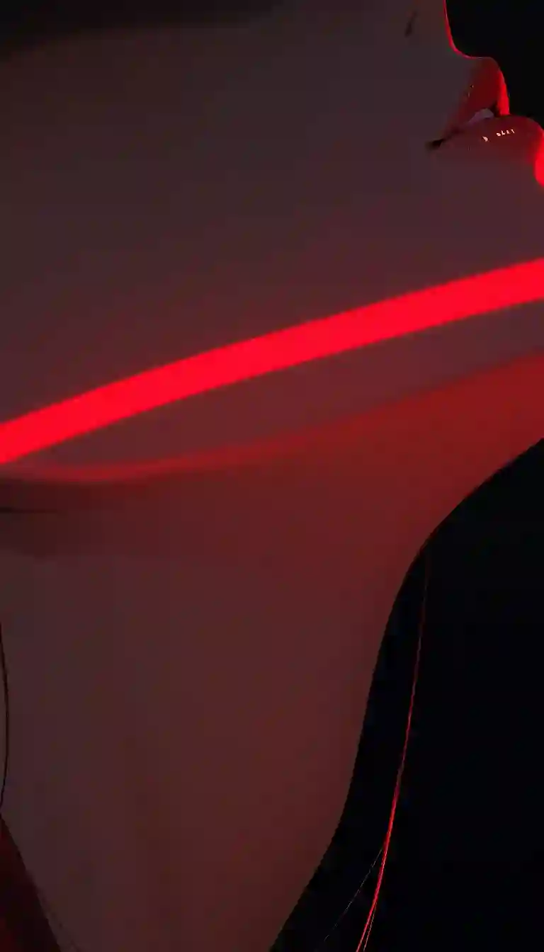 AI art 'Red Light' with user description 'So, there was a power outage, the only light was the emergency lights.
The AC is out; it was hot and... Anyway, so they started fucking.'